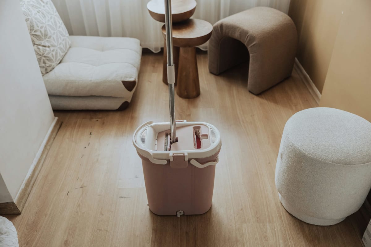 Mop bucket on a wood floor