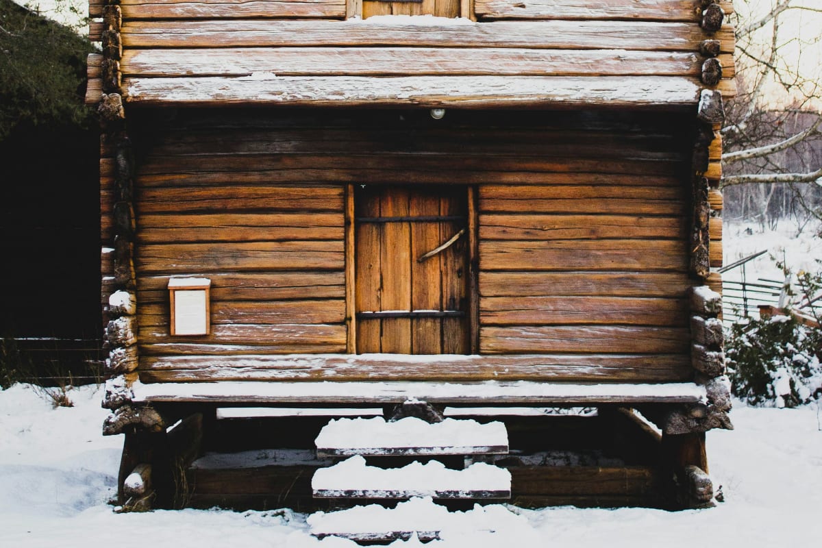 Weathered log cabin wall