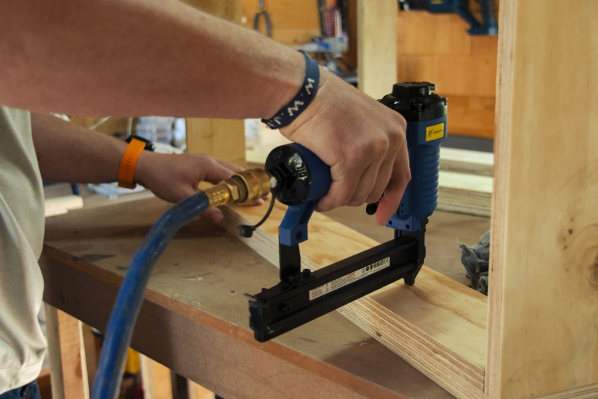 Fastening a frame with a pneumatic nailer
