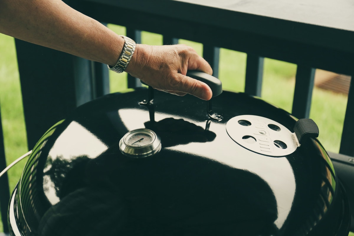 Lifting the lid on a kettle grill