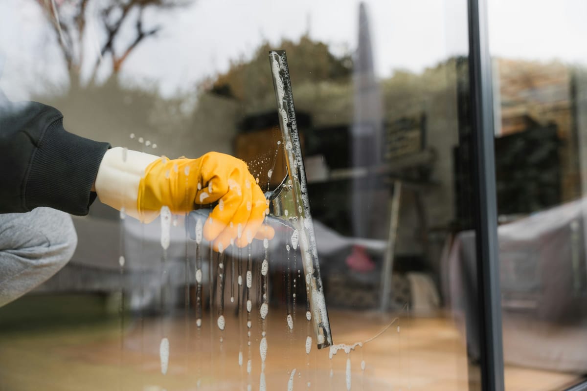 Squeegeeing a glass door
