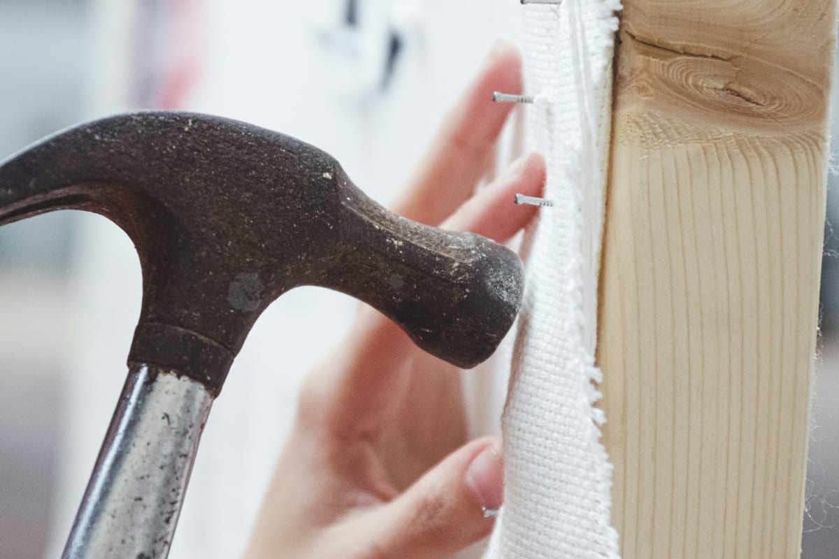Driving a nail with a claw hammer