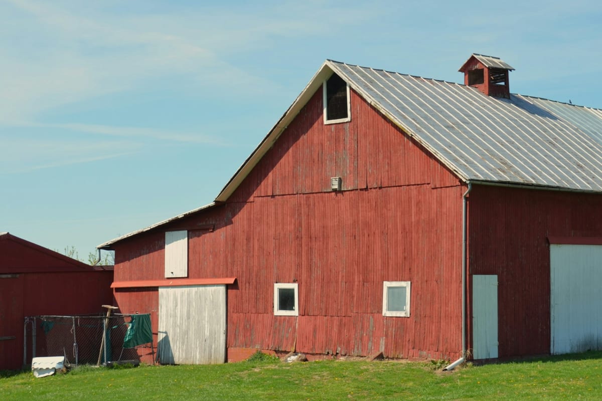 Red barn with a metal roof