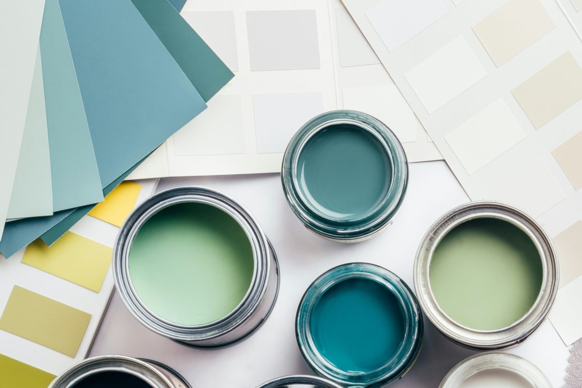 Open paint cans and color swatches