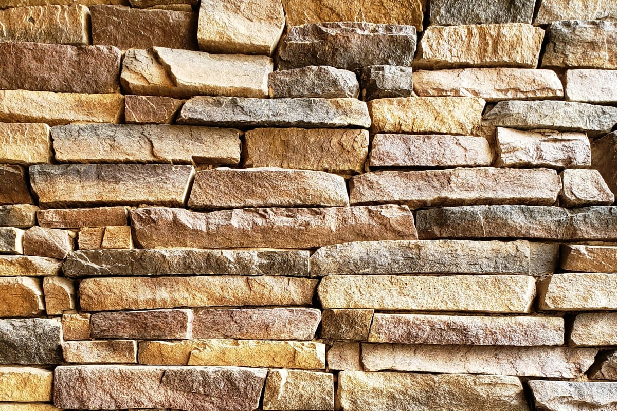 Warm-toned stacked stone wall