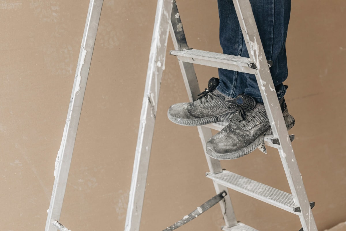 Climbing a step ladder
