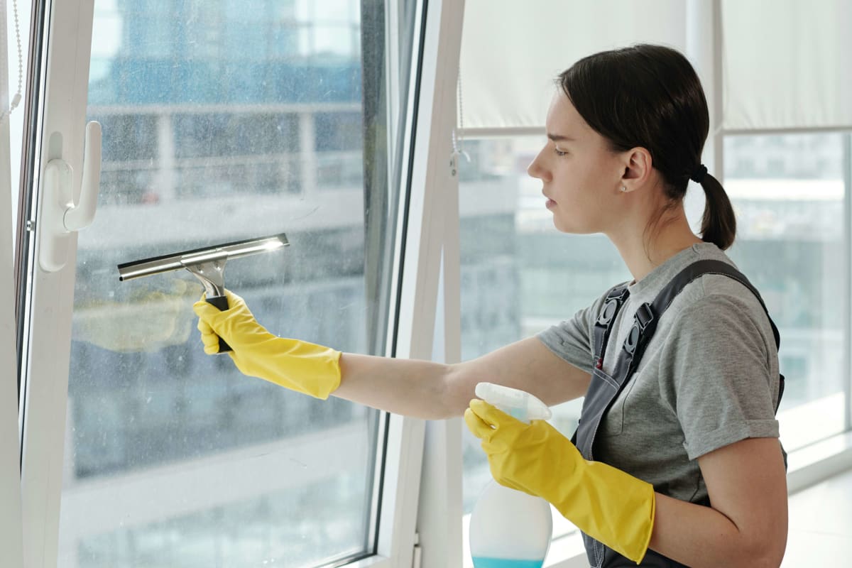Squeegeeing a window clean
