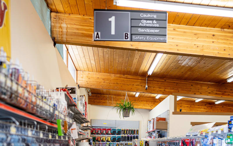 Interior aisle of the Evergreen WBC store showing hardware and building supplies