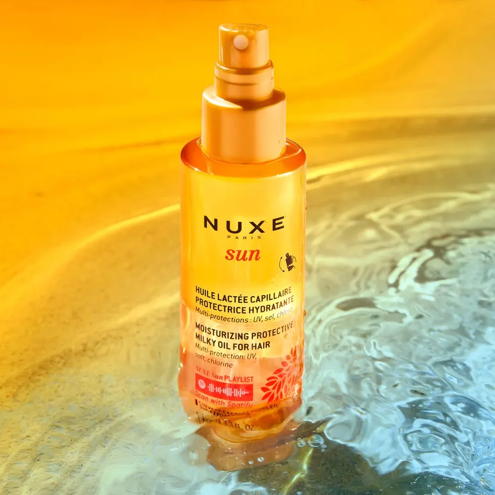 NUXE Sun زيت حليبي للشعر 100 مل + Rêve de Miel عناية الشفاه بالعسل 10 مل + Huile Prodigieuse الذهبي 10 مل + كريم Fondante SPF50 50 مل = حقيبة + 3 هدايا