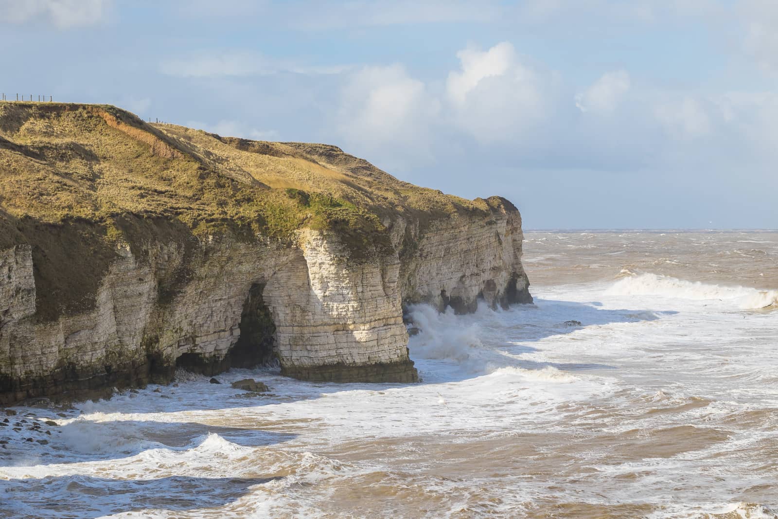 Chalk cliffs above breaking waves at Flamborough Head