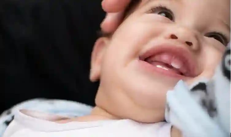 first-tooth-age