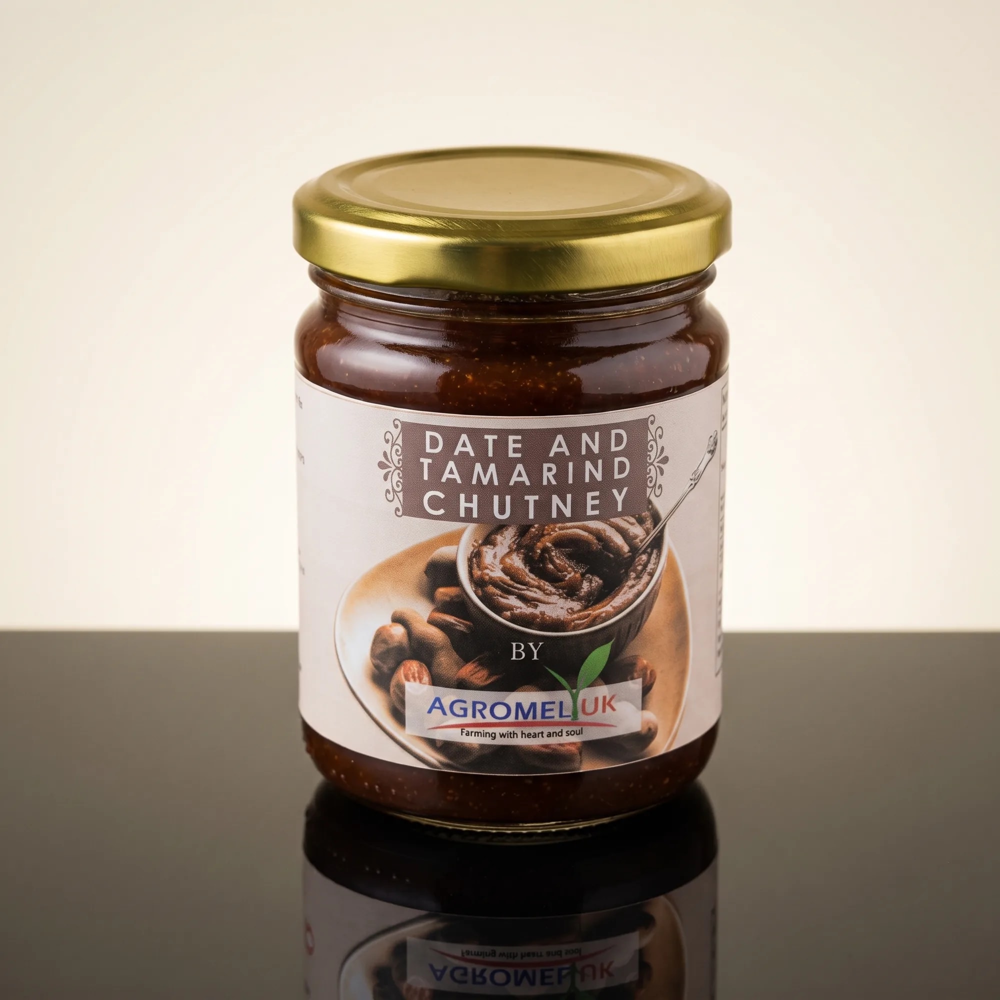 Date & Tamarind Chutney 275g jar on a reflective glass surface — made in Sri Lanka, from Agromel UK