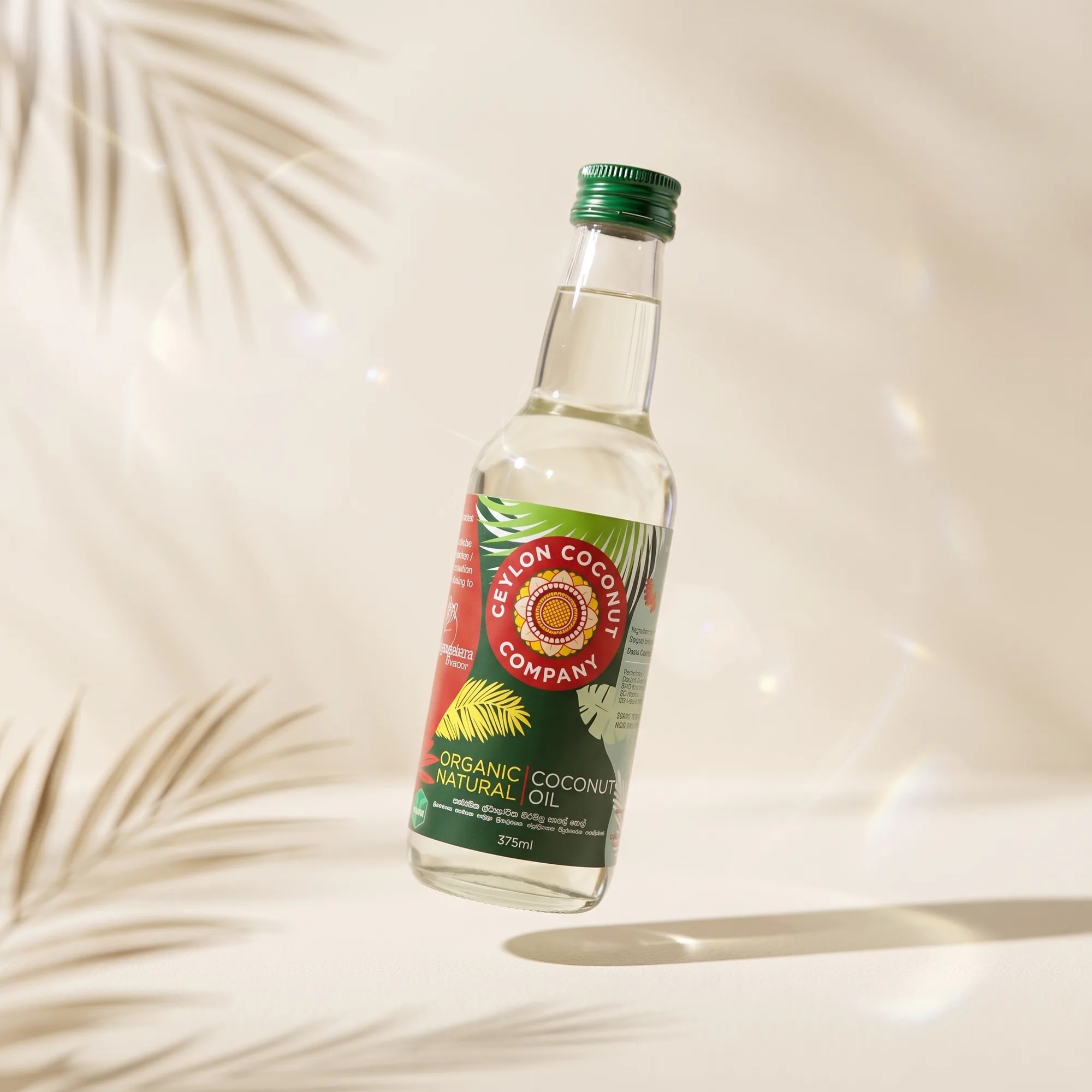 Organic Natural Coconut Oil 375ml bottle in a styled lifestyle scene (view 2) — made in Sri Lanka, from Agromel UK