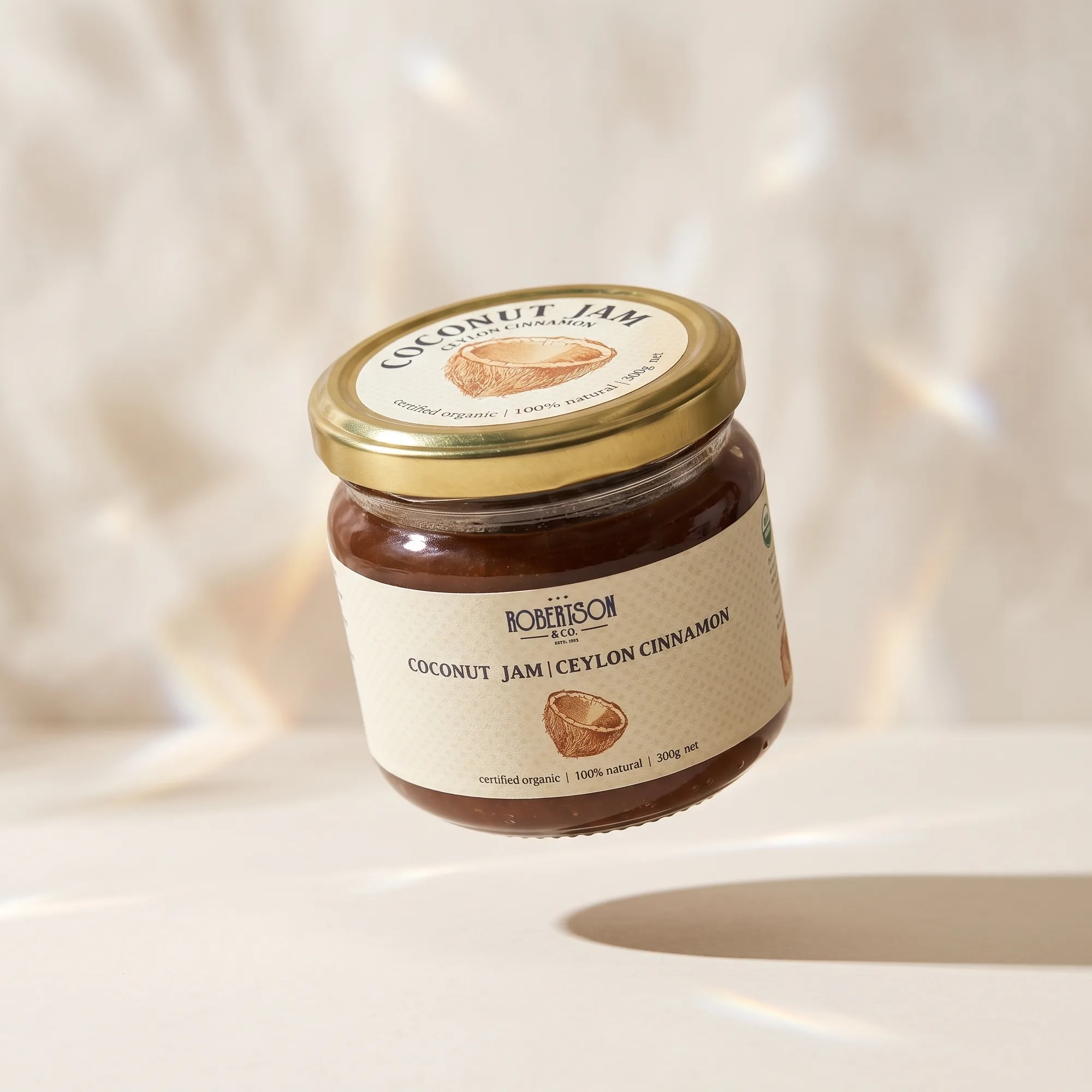 Organic Coconut Jam — Ceylon Cinnamon 300g jar in a styled lifestyle scene — made in Sri Lanka, from Agromel UK