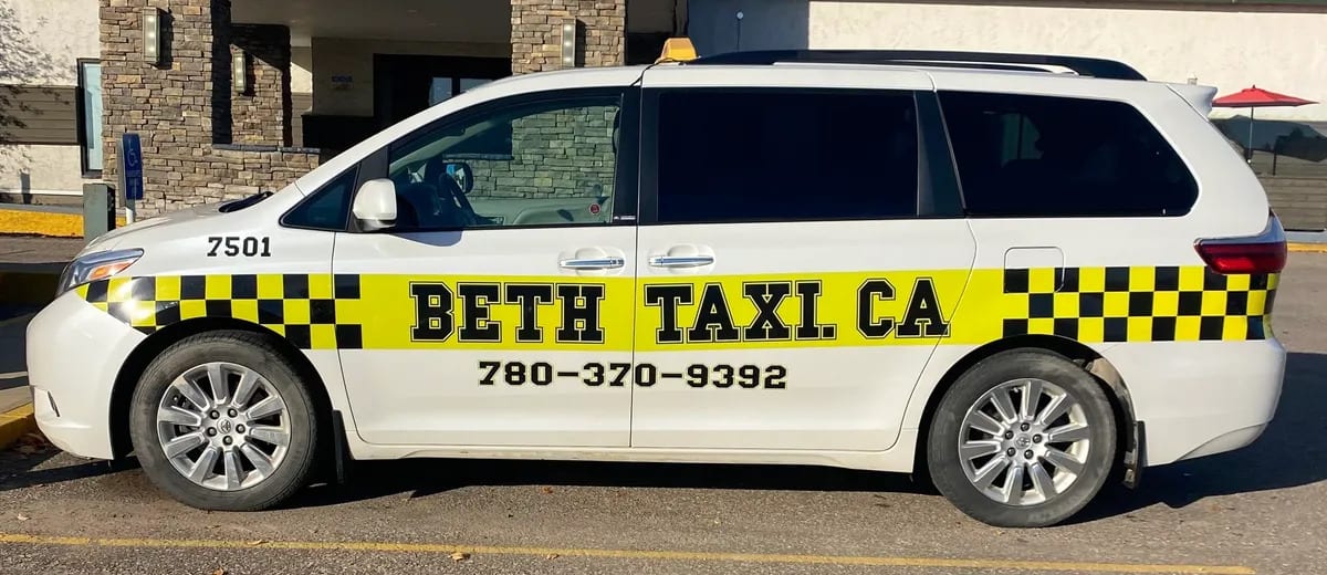 Beth Taxi White Van