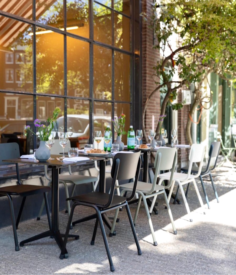 Outdoor tables of Italian food show Amsterdam best terraces for lunch. Article by Table Sage