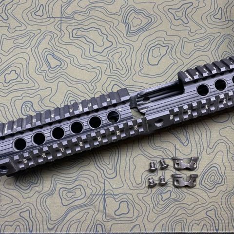 Troy Charlie Drop in free float rail for fixed front sight carbine length ARs. 