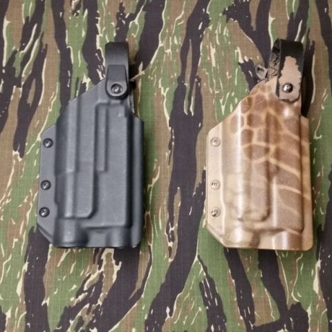 Gundo LLC "duce duce" holsters. Will fit G17/22 AND G19/22 with Tlr1. Set up for safariland mounting, Threaded barrel, RMR, suppressor hight sights. Right hand.