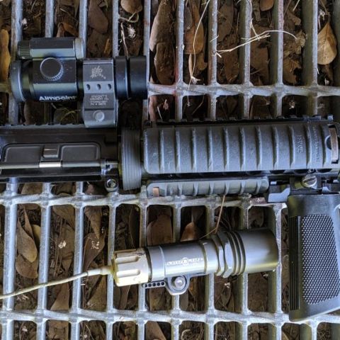 Colt 10.3" MK18 Mod 0/CQBR upper.

Colt 10.3" barrel (factory 10.3", not cut down), KAC M4QD/NT4 flash suppressor, Colt BCG (C marked carrier, CMP bolt), Colt cage code charging handle, Colt side swivel assembly, Matech BUIS, KAC RAS (a little salty) with three panels, and a cool guy CAG Gangsta Grip. Upper is a Colt Expanse (which means who the hell knows where Colt sourced it) with no T-Marks and a ridiculously tight fit to about 90% of the lowers out there.

Available to the buyer are an OG Aimpoint Comp (circa early 90's) in a KAC Straight mount, and a Surefire M95LT-SU06 (fat body M95x with a LaRue mount and SU tapeswitch).