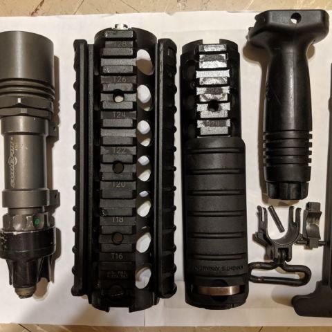 Colt CAGE code marked charging handle SOLD; Colt M4 side sling swivel $30; Salty KAC RAS (Titusville) $SOLD; KAC vertical grip (Titusville) SOLD; Surefire old school fat body M952XM (NO MOUNT) $80. $100 and the whole lot is yours. Feel free to make an offer if you want multiple items.