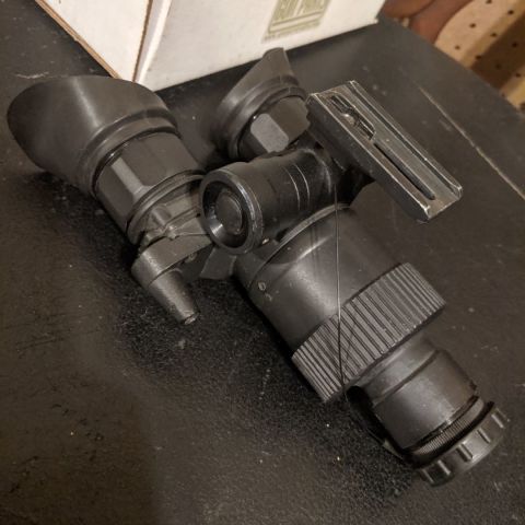 ATN NVG-7. Gen 2 tube, pretty clean image. IR illuminator doesn't work, but aside from that they work fine. PM me for through the tube pics. 