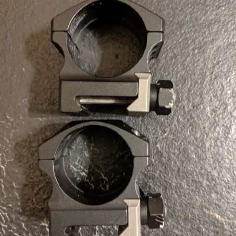 Nightforce .885" low 30mm, 6-screw, Ultralite rings. PN: A264. In great shape aside from some wear on the nuts.

Willing to trade for a decent BCG, Aero slickside upper, SOPMOD stock, PRI Gasbuster (regular weenie latch) or a set of tall-ish Leupold MK4 or PRI 1" rings.