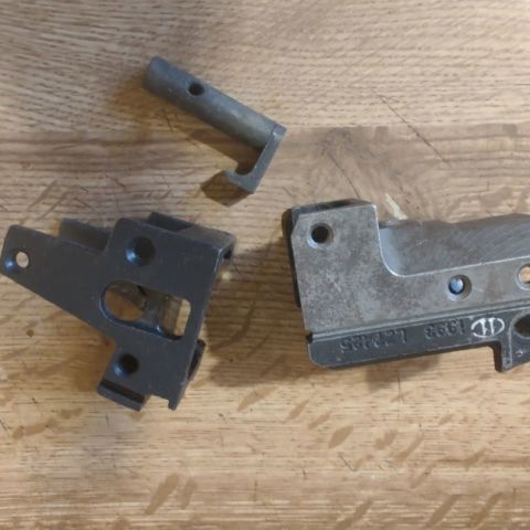 Polish Tantal trunnion (will work with any AK-74, Tantal, or Beryl bolt), and AKS-74 rear trunnion with latch for side folding stock.