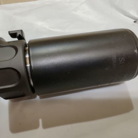 Surefire Warden QD, never fired. Some small scuffs from inside my safe. 