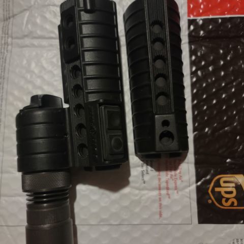 Early style Surefire M500a. Switches, pad, and bulb are all in good shape. OG style round bezel and knurled adapter.