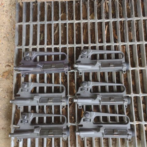 5 Colt grey anodized "CM" marked A2 uppers with .315 front pinholes, and one keyhole marked A2. Used condition, first come first pick.