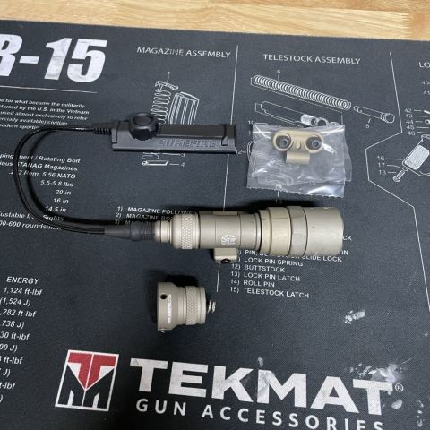 Surefire M340 pro in tan with UE00 and SR07. Comes with picatinny and mlok mounts, box, papers, ckicky tail cap, ue00 tail cap, battery, and sr07 switch. It is in like new condition with very little signs of use.