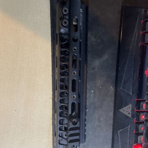 Geissele mk1 10in black rail with 3 rail adapters. Condition pretty new no scratches or wear.