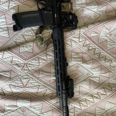 Fn upper with criterion 13.9 barrel, surefire warcomp p/w, criterion bcg, geissele ch. 100 around through it