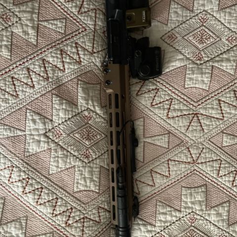 Fn cage upper, barrel, and gas tube. Geissele gas block, Surefire 4 prong, geissele ch, and random bcg with no markings with no rounds fire through it.