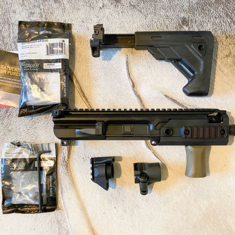 Sig Full upper conversion kit 300 blk. Unfired kit. Also comes with harder to find stock 