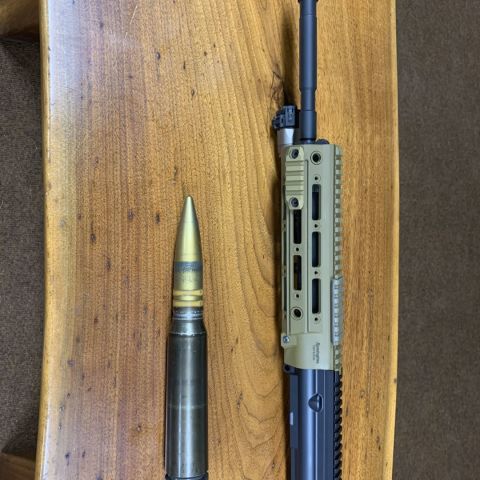 *SOLD*
HK416/MR556 URG

16” Hk barrel 5.56
Remington RAHG fde w/ panels 
Hk operating rod and piston assembly
Hk416 bolt, cam pin, and firing pin. 
HK slimline has block. 
Basically complete minus the carrier and charging handle. 
Comes with LWRC 4 prong flash hider. 
0 round count. 