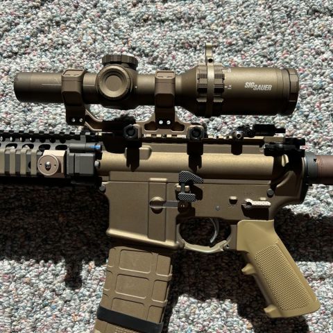 Sig Sauer Tango 6, 1-6x w/ Badger Ordinance mount (1.93” I think) 