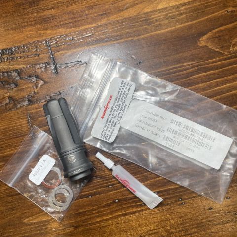 PRICE DROP Brand New Older Surefire 4 Prong Dated 09/13 With Military NSN and Cage Code ETC. With Older 70031-1/A Shims Kit. Comes with Loctite. Never Mounted
