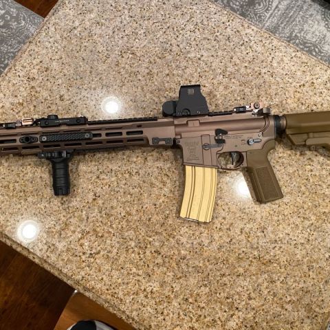 Geissele Super Duty DDC 14.5" Pinned and Welded with Surefire CTN FH, Surefire Warden QD, Geissele DDC BUIS, Modlite 18650 body w/OKW Head, Surefire SR07 Tapeswitch with UE Tailcap, Cloud Defensive LCS, EOTECH XPS2-0, QD Sling Mount, B5 Bravo StocK Coyote, B5 P23 Coyote Grip, Tango Down QD VFG, Dura-Mag Desert Gold 30 RD Mag, 
