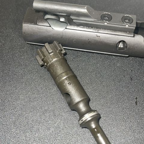 Colt Bolt and Carrier. Rare C Marked Carrier and MPC marked Bolt. No firing pin, cam pin, firing pin retainer. All 3 of these parts can be purchased from brownells for like $20 for genuine colt parts.