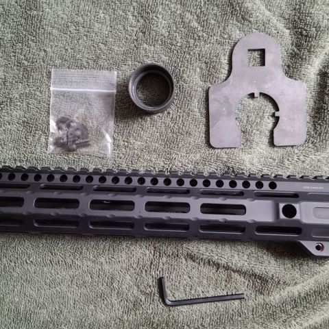 Midwest Industries 11.5 Combat Rail. Pretty much brand new and all the mounting hardware 
