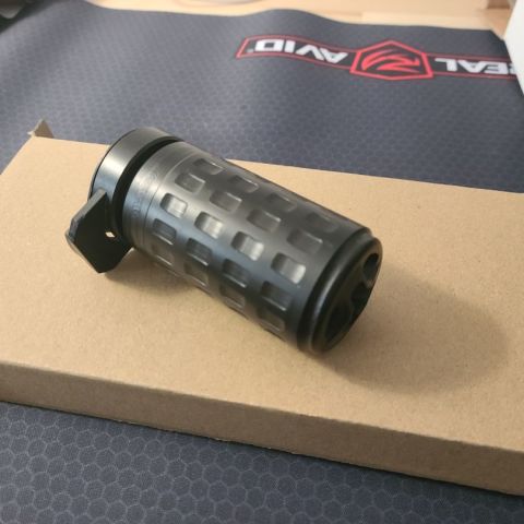 Griffin Armament Gatelock blast shield. I trimmed the ears off to make it lower profile and less snag.