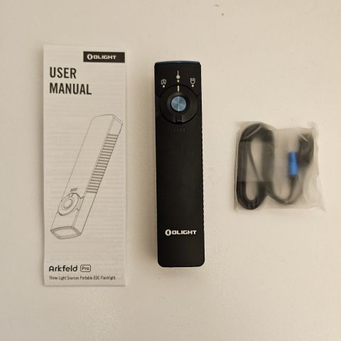 Olight Arkfeld Pro. New In Box