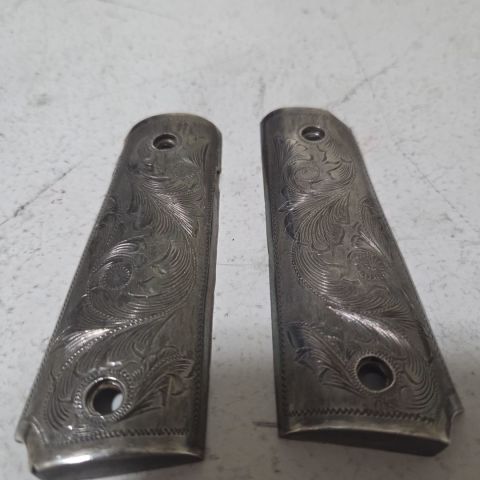 Sterling silver 1911 grips. 