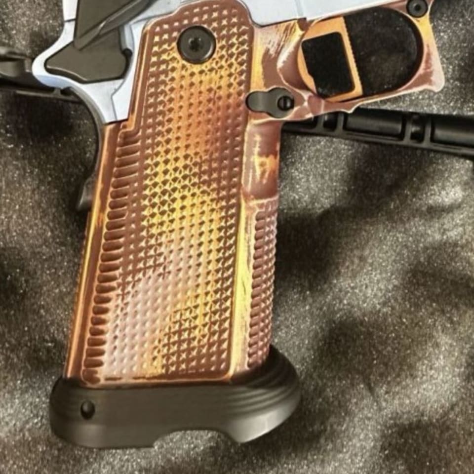 Image 1 - Metal 2011 Grip / infinity trigger/ internals