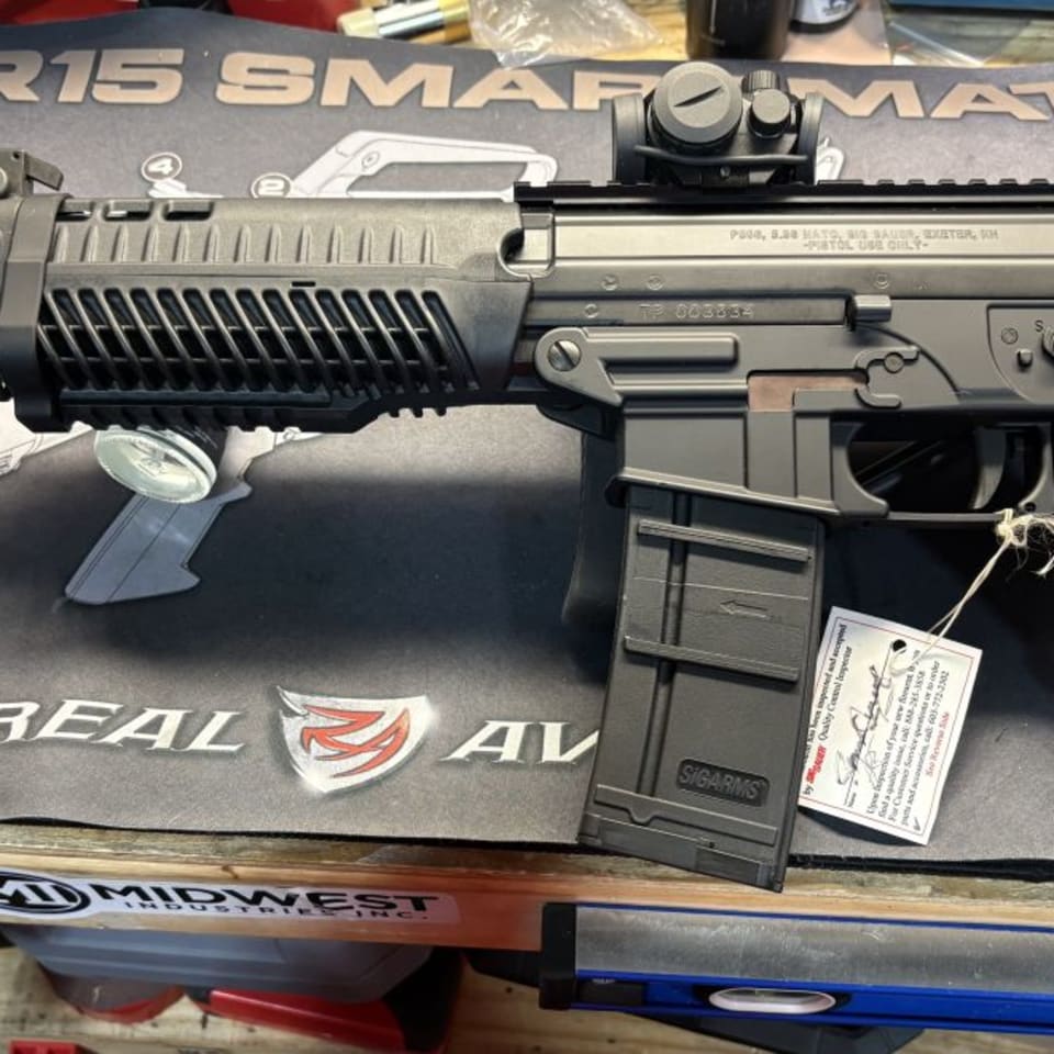 Image 1 - SIG P556