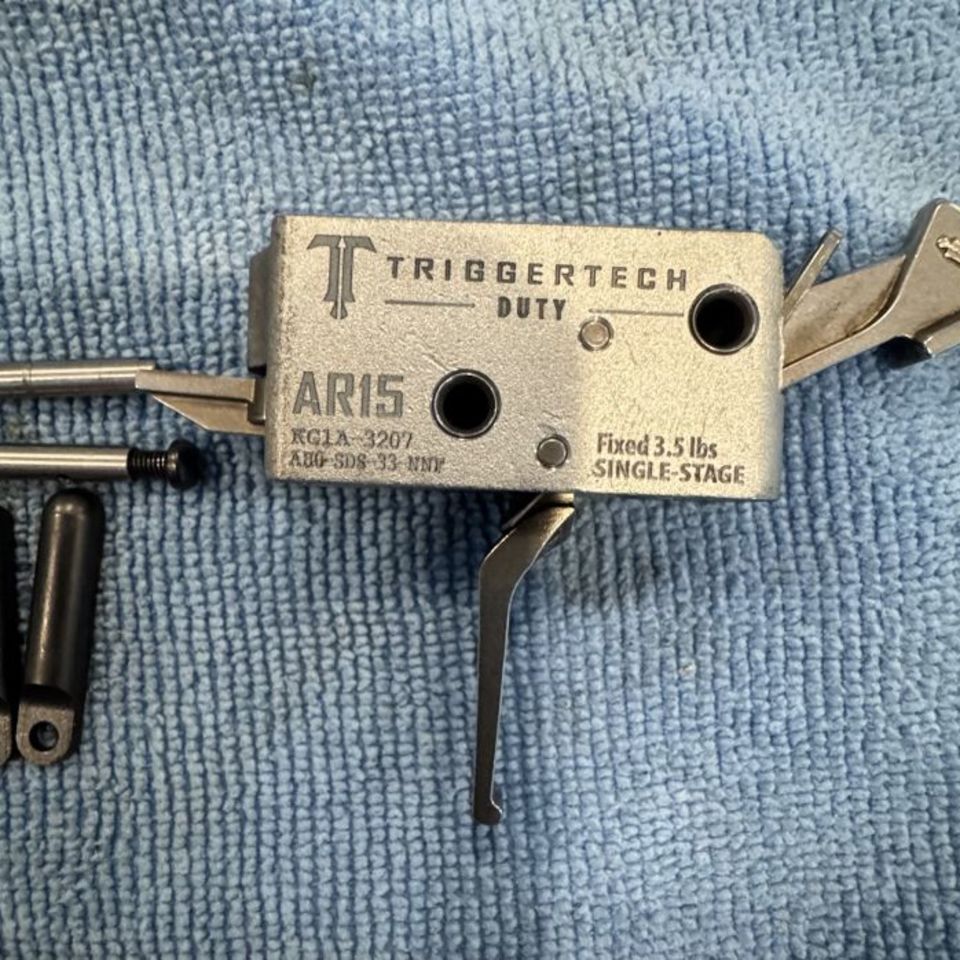 Image 3 - Geissele and TT duty triggers