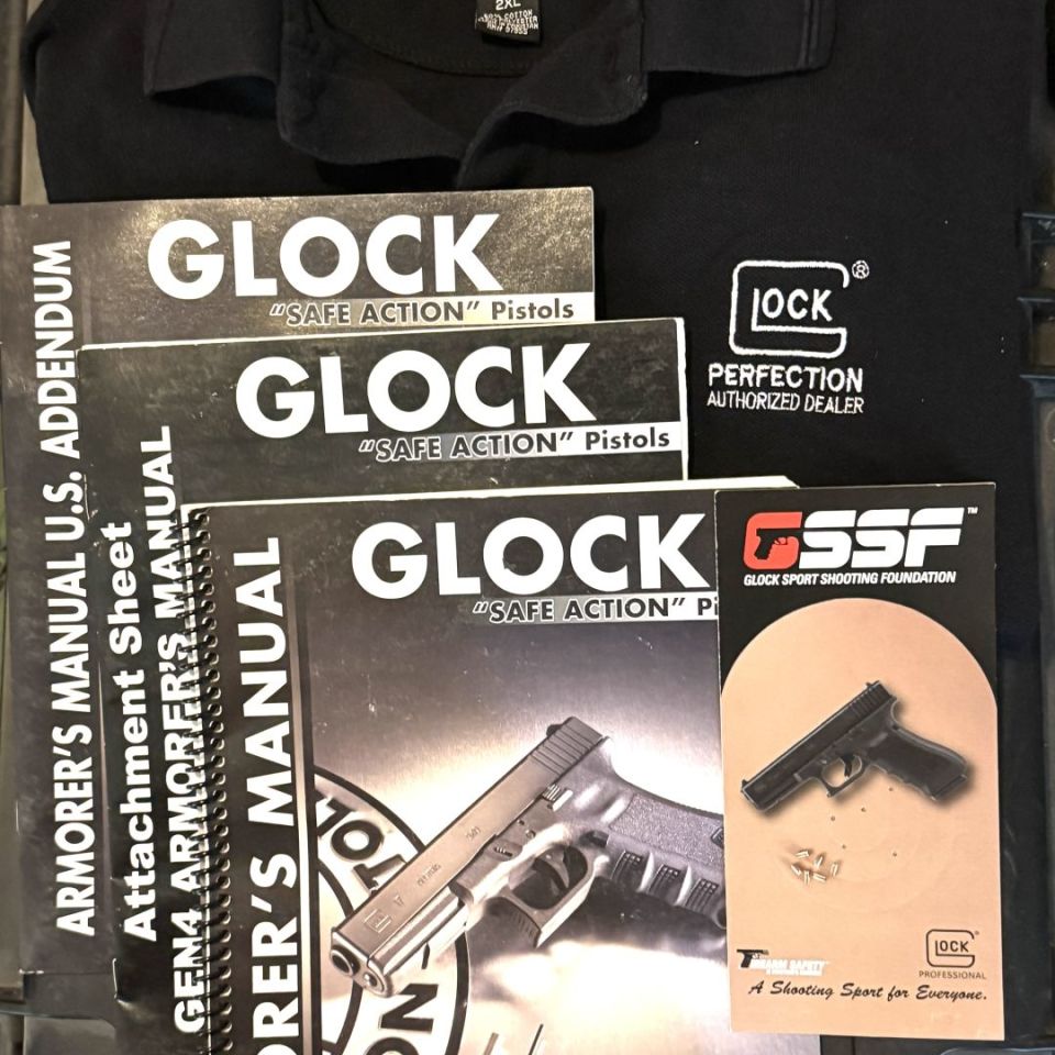 Image 2 - glock armorer docs and a shirt