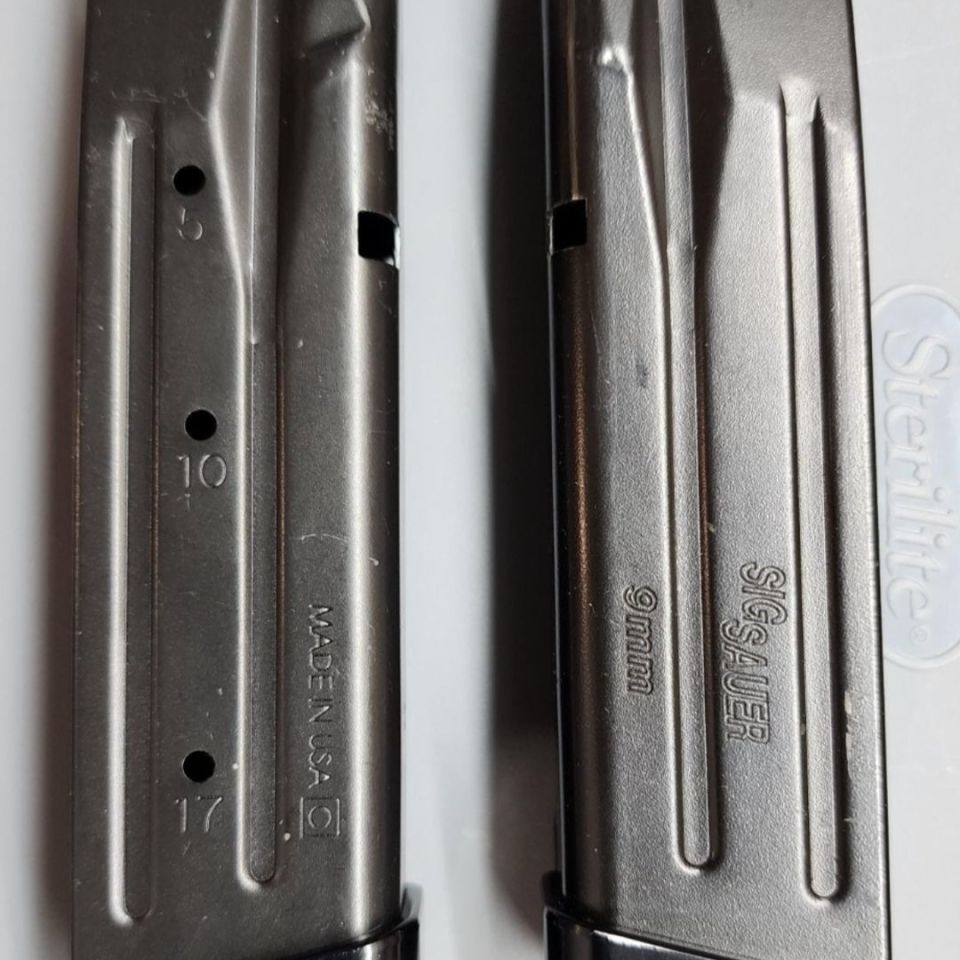 Image 1 - Two Factory Sig Mags