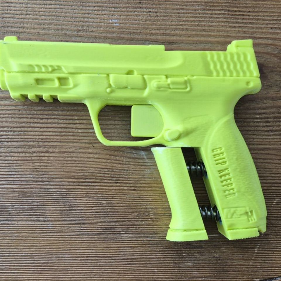 Image 4 - Blueguns & GripKeeper trainers